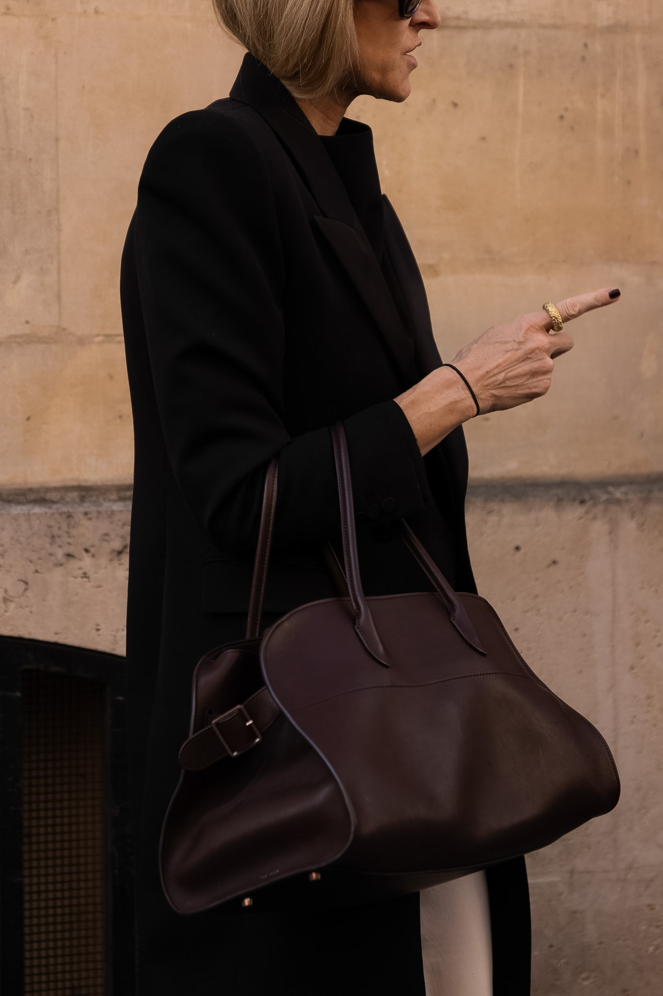 Streetstyle captured outside Acne Studio in Paris AW26/27. Paris street style captured outside of The Row on 4 March 2026.